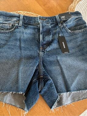 Express Mid-Rise Denim Shorts - Medium Blue. New with Tags. Cross posted. Size 4